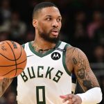 Milwaukee Bucks guard Damian Lillard dribbles the ball against the Los Angeles Lakers at Fiserv Forum on March 13. Benny Sieu/Imagn Images/Reuters