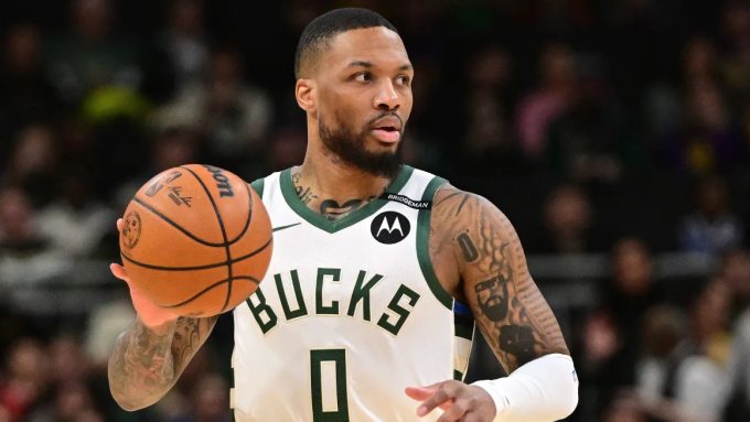 Milwaukee Bucks guard Damian Lillard dribbles the ball against the Los Angeles Lakers at Fiserv Forum on March 13. Benny Sieu/Imagn Images/Reuters