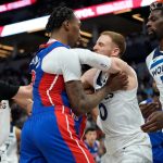 Pistons forward Ron Holland II and Timberwolves Donte DiVincenzo were two of the seven ejected from Sunday's game at the Target Center.
