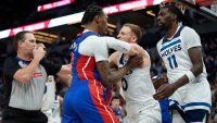 Pistons forward Ron Holland II and Timberwolves Donte DiVincenzo were two of the seven ejected from Sunday's game at the Target Center.