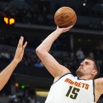 Nikola Jokić's historic night wasn't enough to help the Nuggets win. David Zalubowski/AP