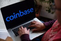 Coinbase Posts Jump in Revenue, Drop in First-Quarter Earnings