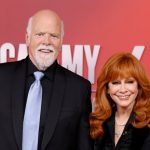 Reba McEntire and Rex Linn Hold Hands at 2025 ACMs Red Carpet