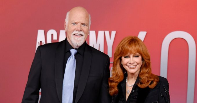 Reba McEntire and Rex Linn Hold Hands at 2025 ACMs Red Carpet