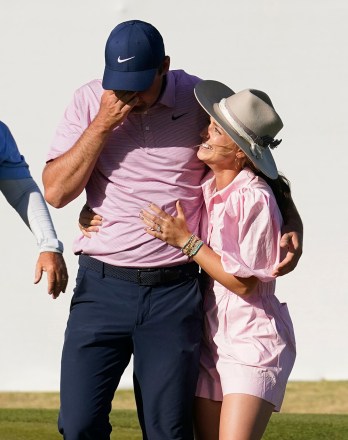 Scottie Scheffler, left, reacts as he gets a hug from his wife, Meredith, after winning the Dell Technologies Match Play Championship golf tournament, in Austin, Texas
Match Play Golf, Austin, United States - 27 Mar 2022