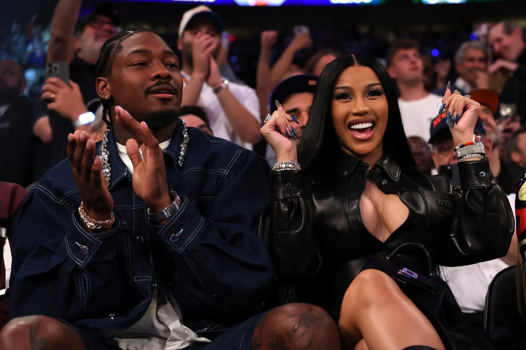 NEW YORK, NEW YORK - MAY 12: (L-R) NFL Player Stefon Diggs and rapper Cardi B sits court-side during the first quarter in Game Four of the Eastern Conference Second Round NBA Playoffs between the Boston Celtics and the New York Knicks at Madison Square Garden on May 12, 2025 in New York City. NOTE TO USER: User expressly acknowledges and agrees that, by downloading and or using this photograph, User is consenting to the terms and conditions of the Getty Images License Agreement. (Photo by Elsa/Getty Images)