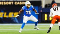 Chargers star LT Rashawn Slater carted off with apparent leg injury at practice