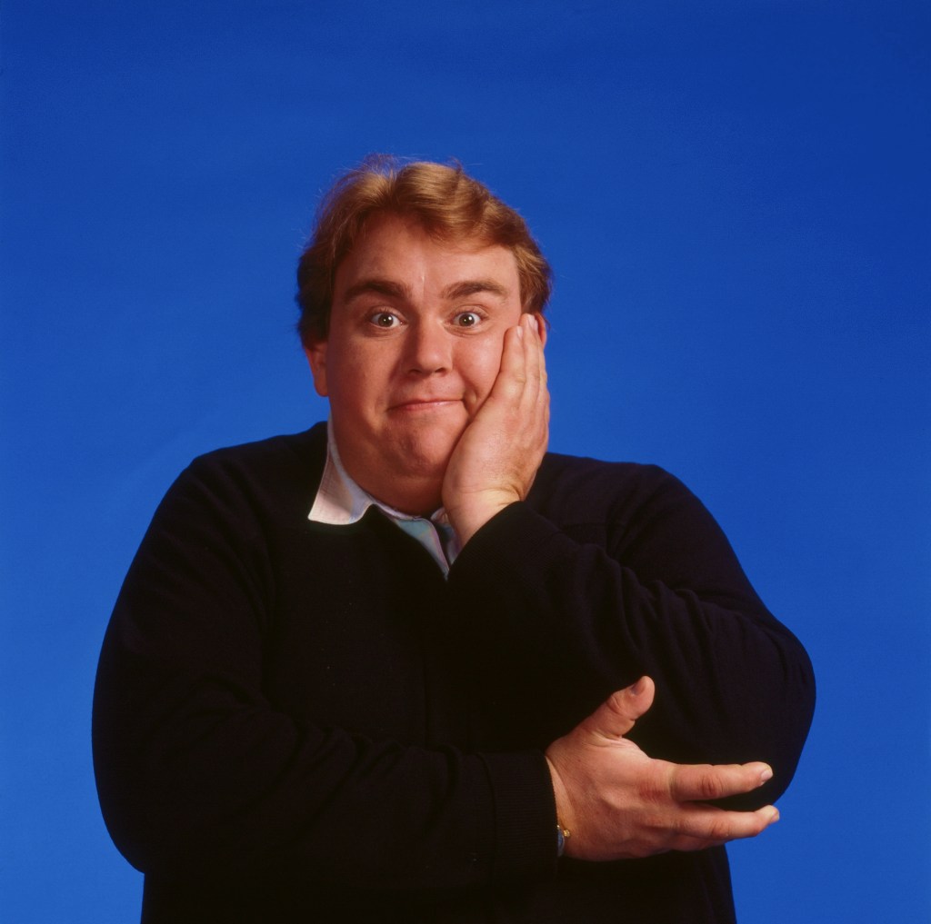 Promotional portrait of Canadian actor John Candy (1950 - 1994), against a blue background, for the film 'Delirious' (directed by Tom Mankiewicz), Los Angeles, California, 1990. (Photo by Steve Schapiro/Corbis via Getty Images)