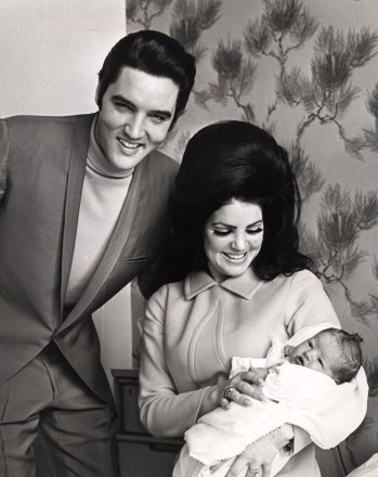 Editorial use only. No book cover usage.Mandatory Credit: Photo by Kobal/Shutterstock (5872503d)Elvis Presley, Priscilla Presley, Lisa Marie PresleyEl Presley - 1968Candid